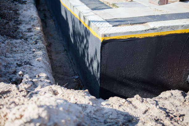 Professional Waterproofing technician working in Battle Creek, MI